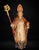 A finely carved and polychromed wooden sculpture depicting a bishop saint, traditionally identified as Saint Rupert,...