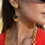 Step into the elegance of ancient Egypt with the Cleopatra’s Sapphire Tears Gold Earrings. Handcrafted from bronze and...