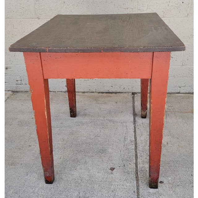 Farmhouse, primitive tavern / work / pub table with barn red painted base. Featuring a very nice patina, areas of wear...