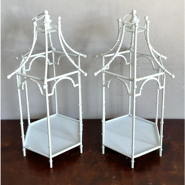 This elegant pair of vintage lanterns perfectly captures the graceful whimsy of the Chinoiserie and Hollywood Regency...