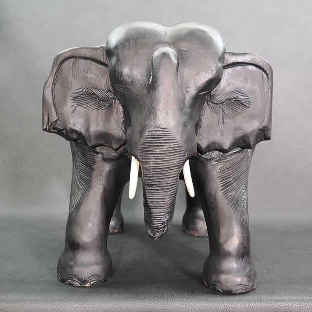 This solid chunk of wood has been carved into an Indian elephant, his sturdy stance and flat back making him the perfect...