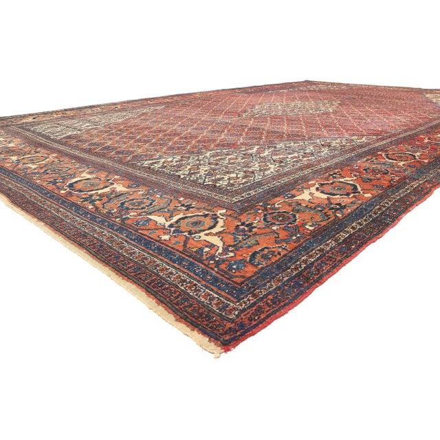 78091 Oversized Antique Persian Bibikabad Rug, 12'11 x 20'00. Step into the enchanting embrace of rustic elegance with...