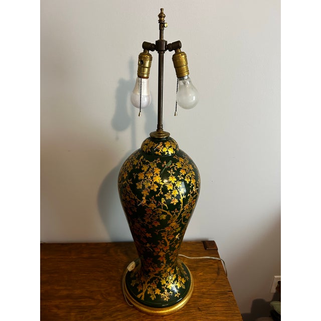 Beautiful antique, ornately decorated, large, table lamp. Made of paper mache and finely laquored in dark green with hand...