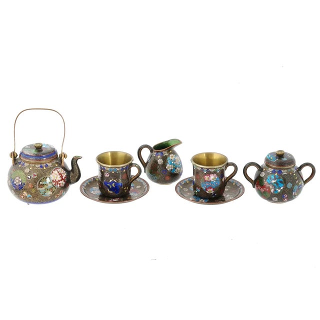 An antique Japanese cloisonne enamel tea set from the Meiji Era, 1868 to 1912. A total of 7 items. The set comprises 2...