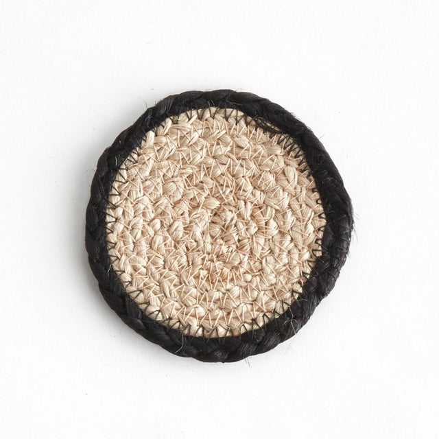 Crafted from jute fiber, this set of four handwoven coasters are highly durable and moisture resistant, making them...