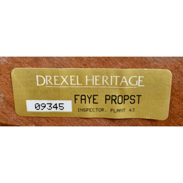 Vintage Side/End Table has a Regency Style. Made by Drexel Furniture. The Wood is YewWood with a Smoked Glass Top. The...