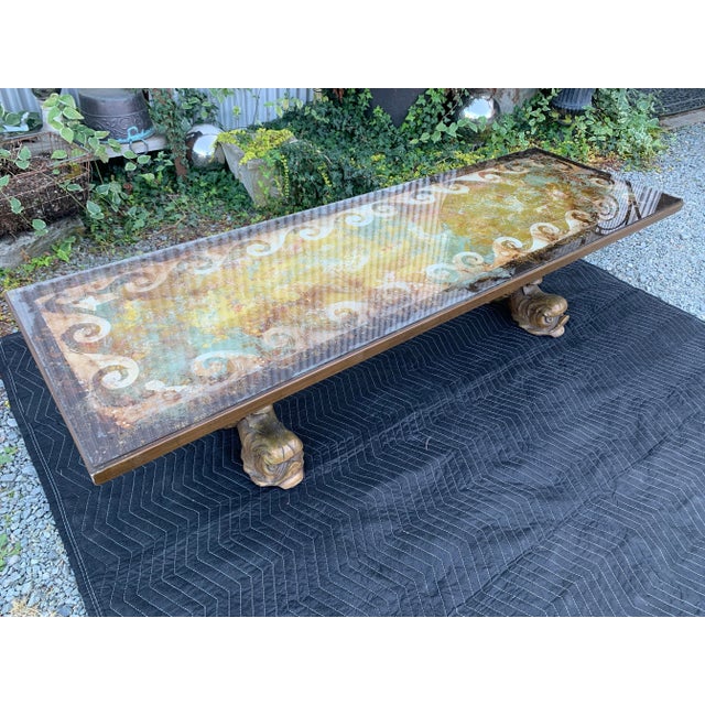 Here we have a fabulous Mid Century Reverse Painted Glass Fontana Arte style coffee table. This table is a stunning work...