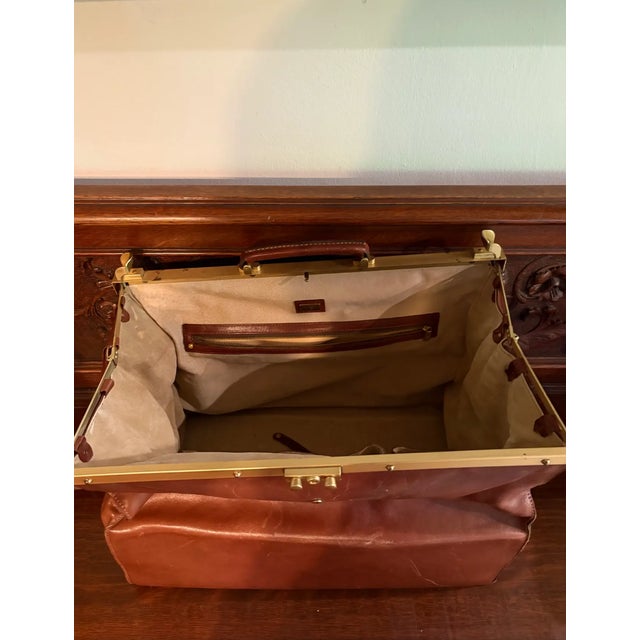 Rare, vintage Italian leather bag with brass frame made exclusively for Mercedes-Benz. Perfect for any vintage Mercedes...