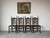 Beautiful vintage Spanish Country dining chairs featuring solid oak construction, classic ladder back design, handwoven...