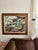 Largescale artwork in a cubist style. Abstract imagery that resembles folded paper or waves. Coloring is warm earth tones...