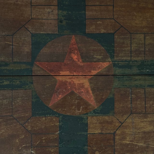 Handmade American folk art Parcheesi game board, ca. 1890–1910. Thick pine planks with original hand-painted finish: black...