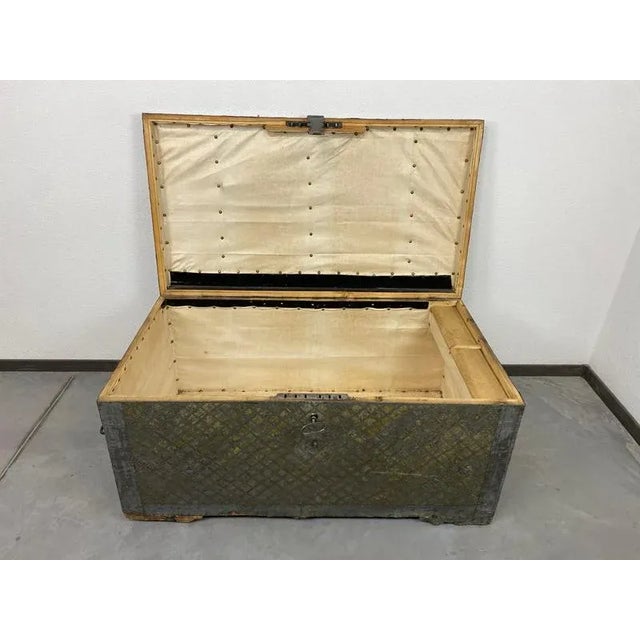 18th century antique travel chest. Solid wood with tin cladding. Baroque lock fully functional with original key.