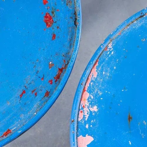 This small round table design is one of our favourites, originally a dusty red the tables have been repainted several...