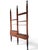 This wall unit with floor-to-ceiling uprights, attributed to Franco Albini's design for Italian production in the 1960s,...