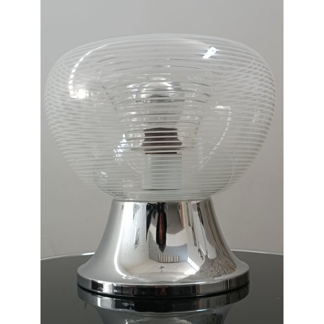 Beautiful table lamp by VeArt. Italy, 1970s. Impressive Murano glass globe, clear and striated with fine white lines....