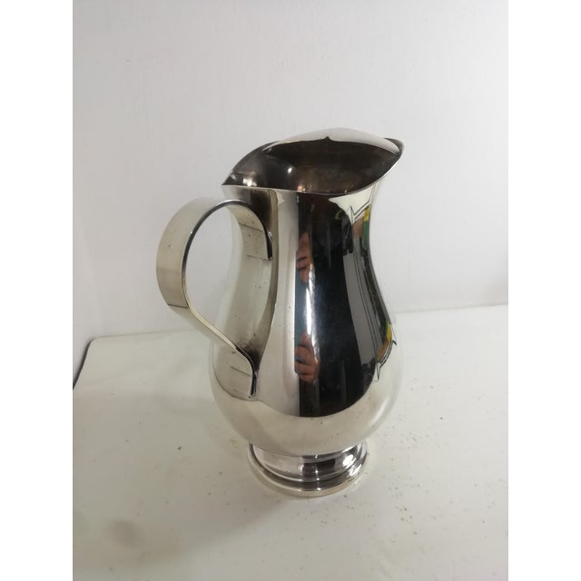 Silver metal jug produced by Fleuron Christofle in France. Very elegant object of undisputed quality. Good original...