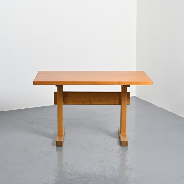 Rectangular tabletop with a solid pine stretcher base, selected for the Les Arcs ski resort. Bibliography: Charlotte...