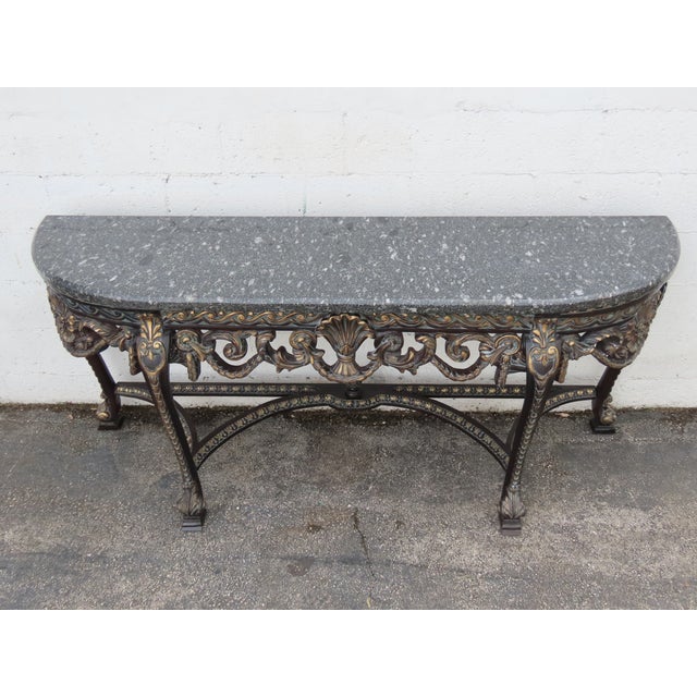 This beautiful Console Table is made out of wood, solid wood, and marble. This gorgeous Console Table has a beautiful...