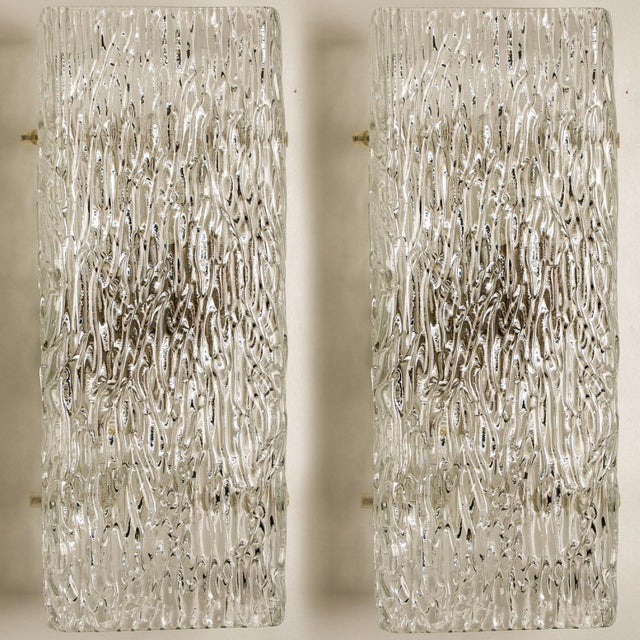 Light fixture by j.t. Kalmar, vienna, austria, manufactured in circa 1960. The glass shows a beautiful wave texture, which...
