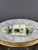 This set comprises twelve plates and a serving platter, all crafted from high-quality ceramic and hand-painted, showcasing...