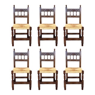 20th Century Set of Six Catalan Chairs in Carved Walnut and Caned Seats For Sale