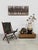 Sit in Style! with this vintage leather folding chair from the 1950s, featuring a classic campaign chair design. The dark...