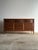 This vintage walnut 9-drawer dresser by Ward Furniture features a clean, symmetrical facade with framed drawer fronts,...