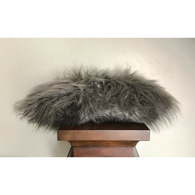 Faux Mongolian pillow in classic gray color with Poly filling Use in your guestroom to dress up the bed, or to add style...