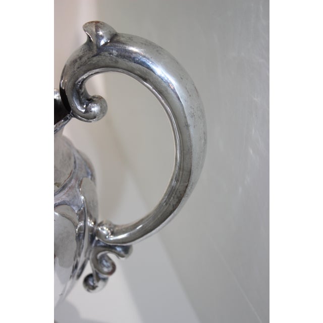 This stylish and Classic melon-form silver plated over copper water pitcher will make a great addition to your barware...