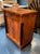 The 19th Century German Biedermeier Walnut and Ebony Cabinet is a piece of antique furniture crafted from high-quality...