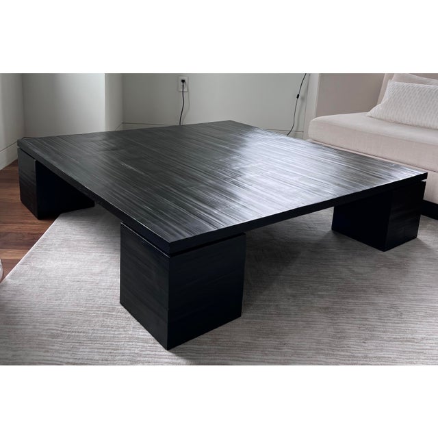 Make a bold, sophisticated statement with this oversized split bamboo coffee table from Armani/Casa. Finished in a rich...