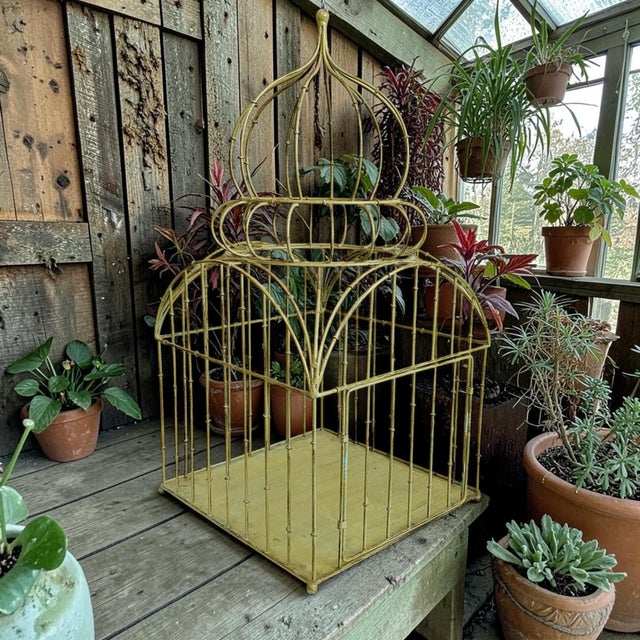 Elevate your home decor with the Green Metal Vintage Victorian Birdcage, a stunning piece that combines elegance and...