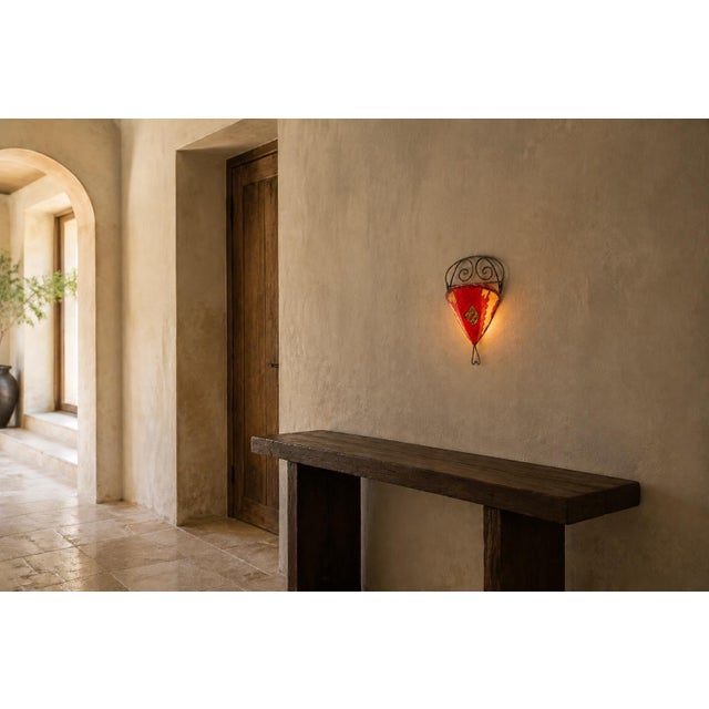 A distinctive vintage Moroccan wall-light shade handcrafted in Marrakech circa 1980, this sculptural piece combines hand-...