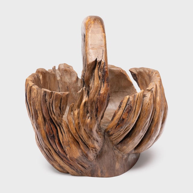 This antique Chinese vessel was carved from a single piece of cypress burlwood to resemble a woven market basket, complete...