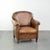 This characterful sheepskin armchair features a comfortable seat and a beautiful patina. The armchair has a fixed seat...