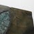Large wall sculpture features teal glass leaves on a hand-textured resin designed to look like natural dark stone Very...