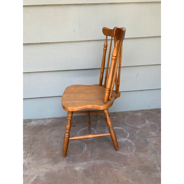 1950s Rustic/Farmhouse style wood side chair with turned posts and curved back.