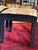 Textile Pair Mid Century Orange and Black Ottomans Upholstered in the Manner of Jack Lenor Larsen For Sale - Image 7 of 9