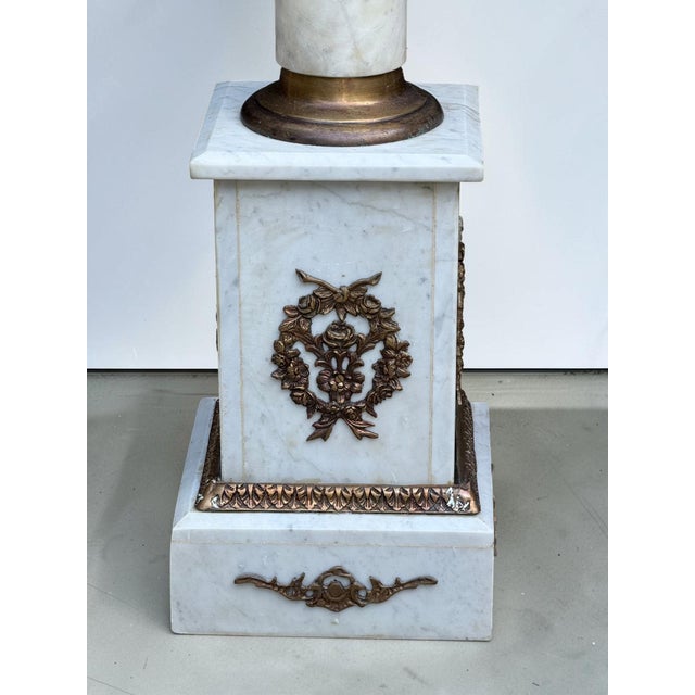 VERY HEAVY & SOLID PEDESTALS, these are not a modern "dupe". Beautiful natural marble with gilded bronze accents....