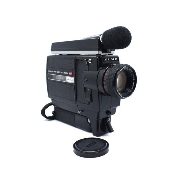 Capture the nostalgic essence of the 1970s with this beautifully preserved Elmo Super 8 Sound 350SL Macro movie camera. A...