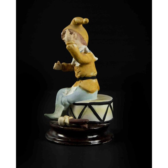 Child and Tambourine is an original decorative object realized in the second half of the 20th century. Made in Italy....