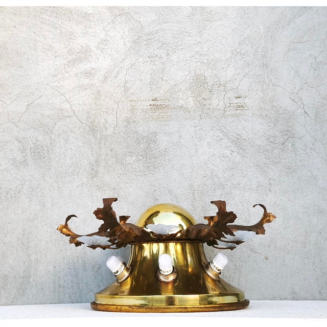 An exquisite vintage Italian Florentine lamp crafted from polished brass, gold-plated metal leaf and delicate hand-...