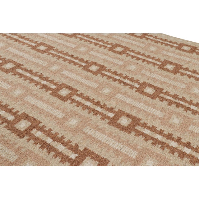 This 9x11 Swedish-style rug, handwoven in a wool flatweave, is from the inventive “Nu” texture in Rug & Kilim’s award-...