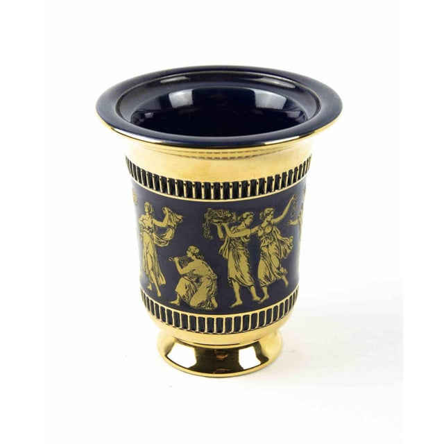 Small gilded & blue vase is an original decorative object hand-made in the 1970s, in the style of the italian designer...