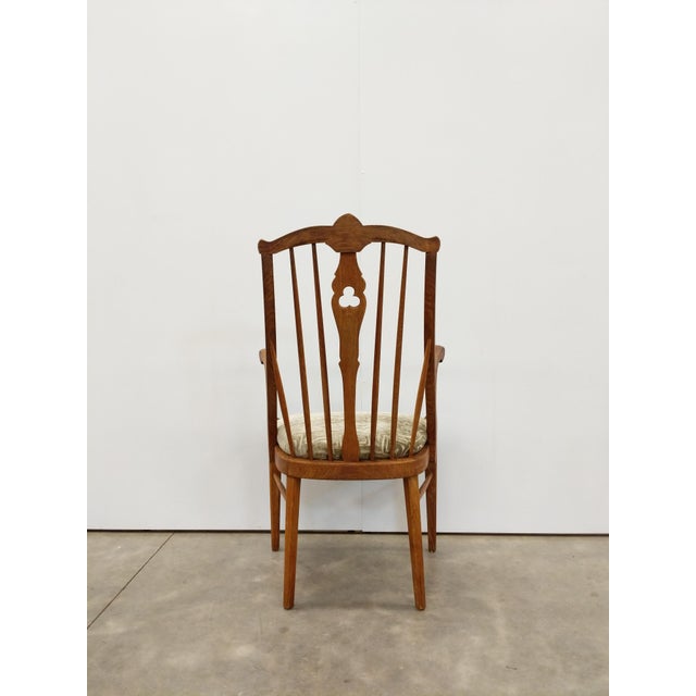 Authentic antique / vintage Danish / Scandinavian oak armchair. This chair is in great shape with brand new upholstery...