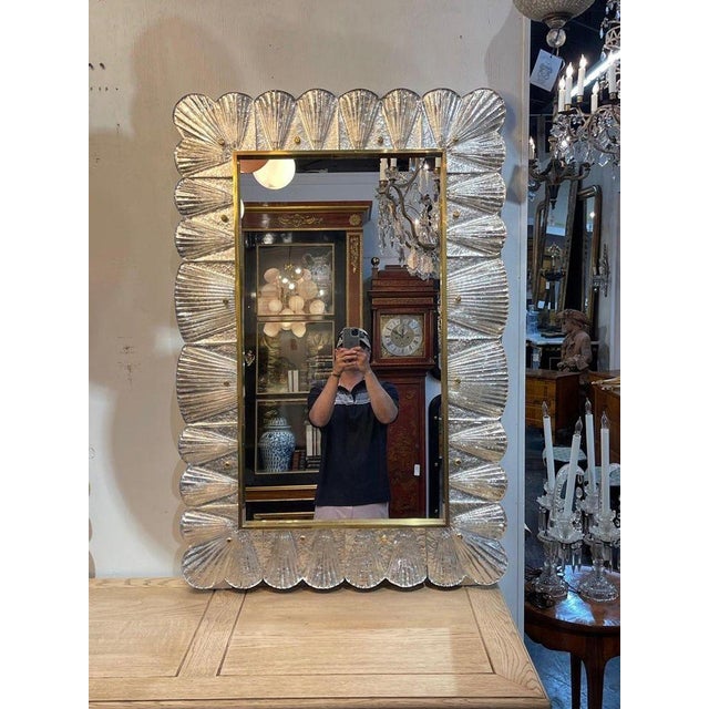 Modern Murano glass and brass "ruffle" mirror. Circa 2000. Available in other colors. Sure to make a statement!