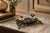 French Art Nouveau inkstand dating to circa 1900, made from bronze-toned metal with two glass inkwells. Trailing ivy...