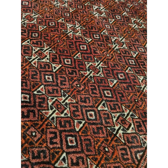 Authentic, semi-antique, hand-knotted Turkmen Tekke rug, hailing from the great tribal textile tradition of Central Asia....