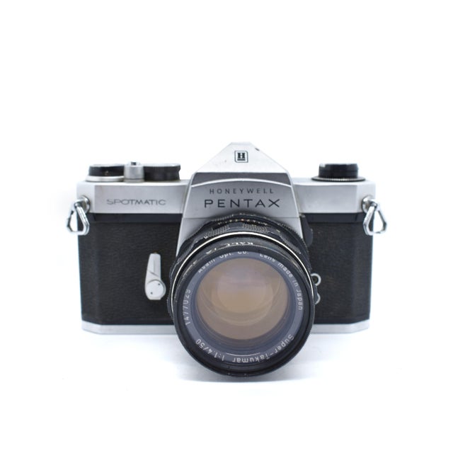 This vintage camera, crafted in Japan, boasts a sleek silver body and manual focus capabilities, offering a nostalgic...