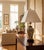 Elevate your interior with this sophisticated vintage porcelain ginger jar table lamp, dating to the 1980s-1990s. The...